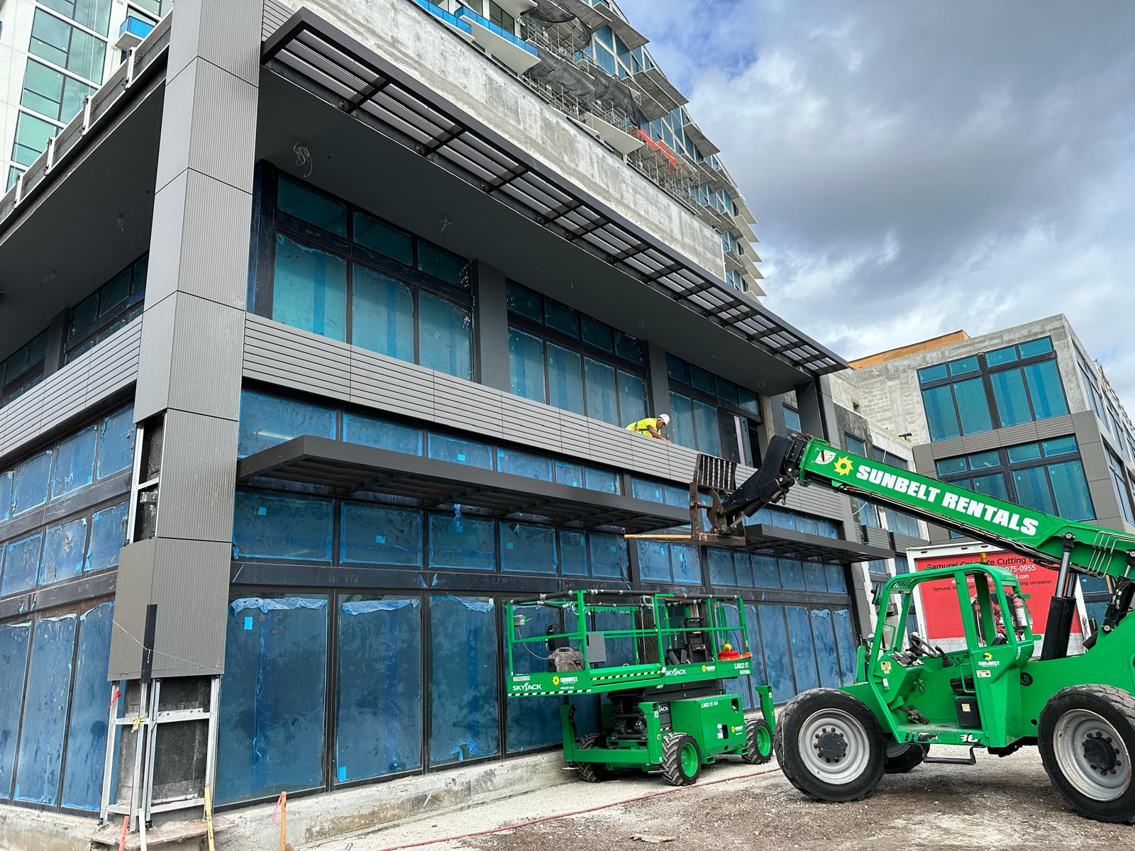 Corner facade sunshade system at 575 Downtown in West Palm Beach