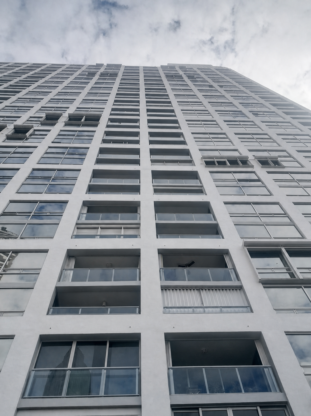 Tower elevation with balcony railings at The Palace in Brickell, Miami