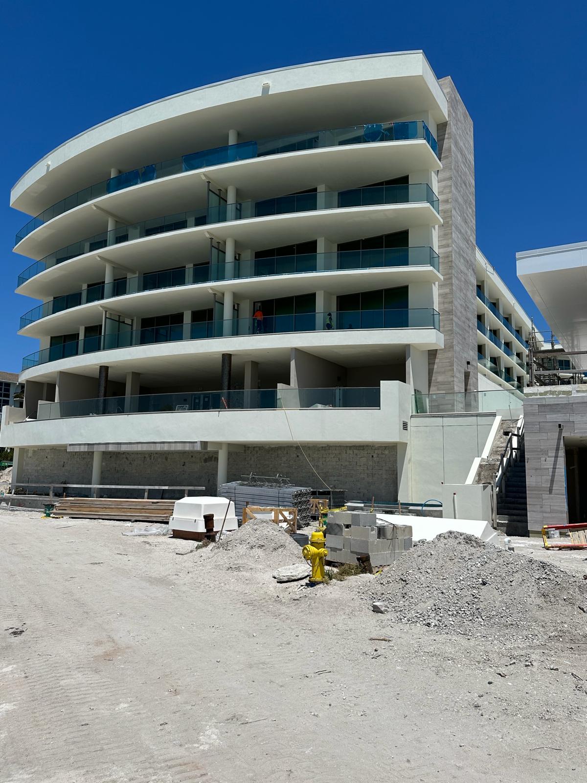 Exterior view of St. Regis Resort glass railings